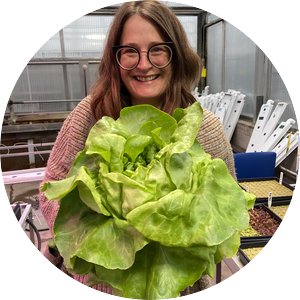 Mary Rogers holding lettuce