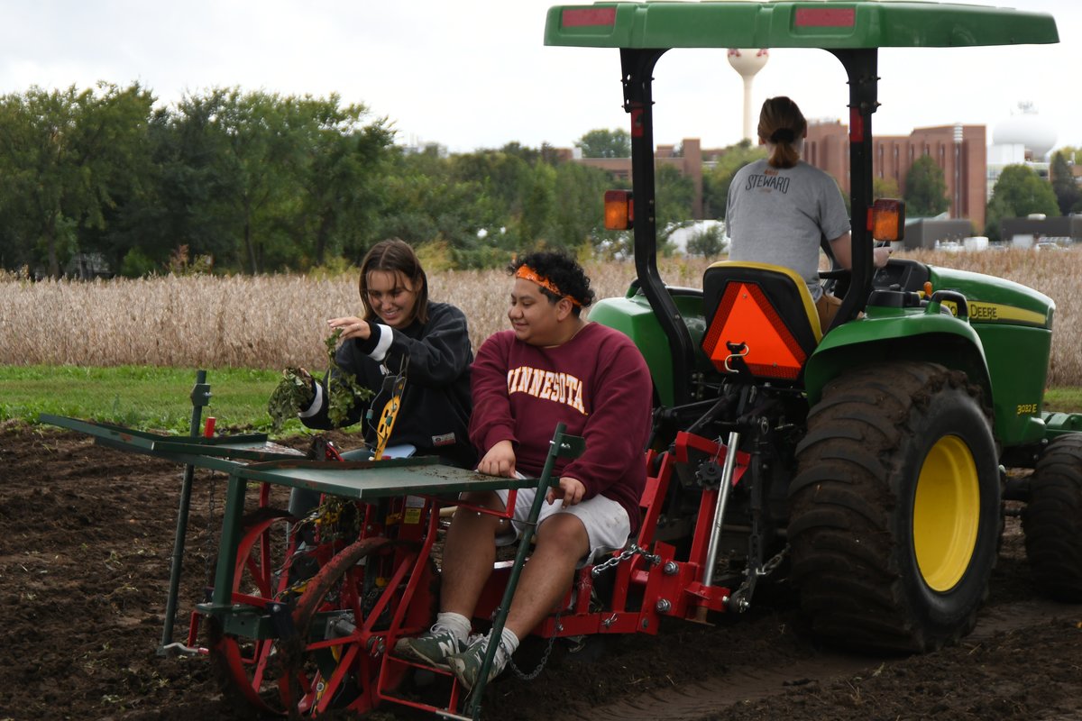 Students learning to drive tractors on the St. Paul Campus